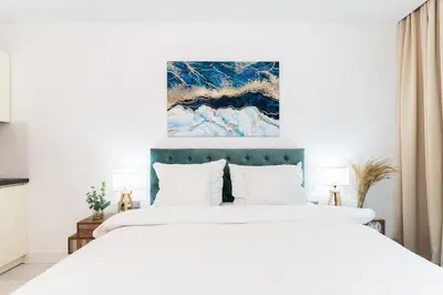 Łóżko lub łóżka w pokoju w obiekcie PLATER PREMIUM APARTMENTS