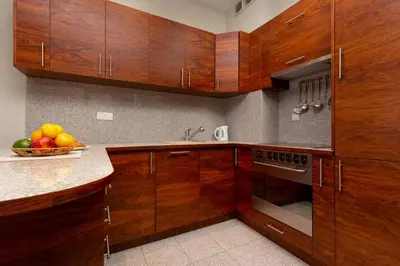 Kuchnia lub aneks kuchenny w obiekcie Apartments Chełmońskiego Warsaw Ursus by Noclegi Renters
