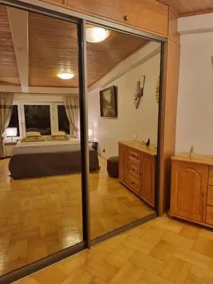 Łóżko lub łóżka w pokoju w obiekcie Stylowe poddasze