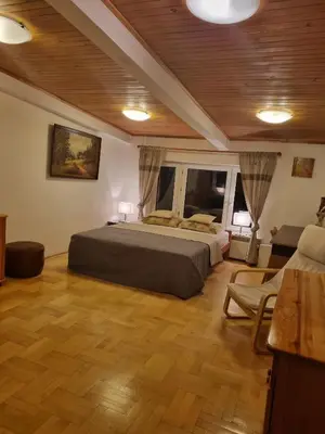 Łóżko lub łóżka w pokoju w obiekcie Stylowe poddasze