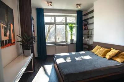Łóżko lub łóżka w pokoju w obiekcie Apartament Powiśle