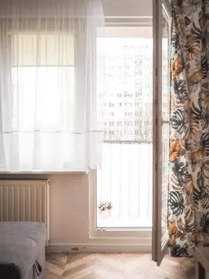 Łóżko lub łóżka w pokoju w obiekcie APARTEL Królikarnia