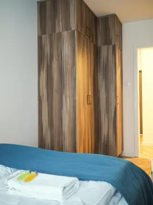 Łóżko lub łóżka w pokoju w obiekcie APARTEL Królikarnia