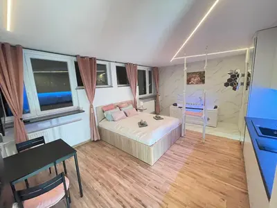 Łóżko lub łóżka w pokoju w obiekcie YOURAPART JACUZZI przy ZAMKU KRÓLEWSKIM