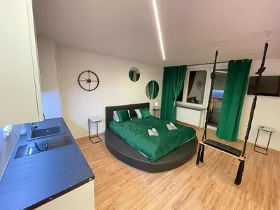 Łóżko lub łóżka w pokoju w obiekcie YOURAPART JACUZZI przy ZAMKU KRÓLEWSKIM