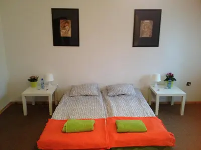 Łóżko lub łóżka w pokoju w obiekcie Place4Us