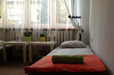 Łóżko lub łóżka w pokoju w obiekcie Place4Us