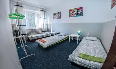 Łóżko lub łóżka w pokoju w obiekcie Place4Us