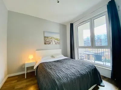 Łóżko lub łóżka w pokoju w obiekcie Warsaw City Travel Apartments