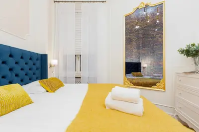 Łóżko lub łóżka w pokoju w obiekcie Royal Apartment Kopernika by Renters Prestige