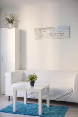 Część wypoczynkowa w obiekcie Rondo ONZ Business Apartment by BookingHost
