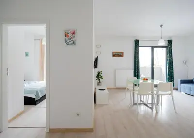 Łóżko lub łóżka w pokoju w obiekcie FIRST - Green Żoliborz Apartment 6