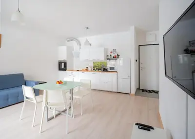 Kuchnia lub aneks kuchenny w obiekcie FIRST - Green Żoliborz Apartment 6