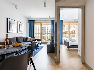 Łóżko lub łóżka w pokoju w obiekcie Kolejowa ApartHotel
