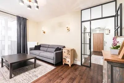 Część wypoczynkowa w obiekcie Fort Wola 12A by Homeprime