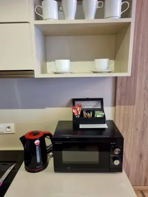 Zestaw do parzenia kawy i herbaty w obiekcie Warsaw Apartments - Luxury Top-view Aparthotel
