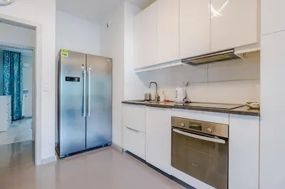 Kuchnia lub aneks kuchenny w obiekcie Family Apartment Żoliborz by Noclegi Renters