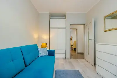 Część wypoczynkowa w obiekcie Family Apartment Żoliborz by Noclegi Renters