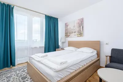 Łóżko lub łóżka w pokoju w obiekcie ShortStayPoland Darwina (B9)