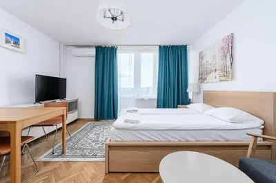 Łóżko lub łóżka w pokoju w obiekcie ShortStayPoland Darwina (B9)