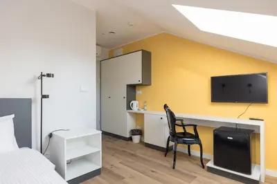 Kuchnia lub aneks kuchenny w obiekcie ĄĘ Hostel Nowy Świat by BookingHost