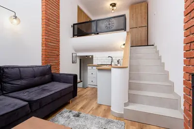 Kuchnia lub aneks kuchenny w obiekcie City Center Mezzanine Studio Chmielna by Noclegi Renters