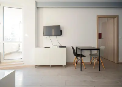 Telewizja i/lub zestaw kina domowego w obiekcie Extra Green Kabaty Apartament nr 5