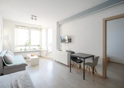 Telewizja i/lub zestaw kina domowego w obiekcie Extra Green Kabaty Apartament nr 5