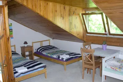 Łóżko lub łóżka w pokoju w obiekcie HomeHostel