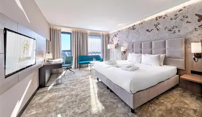 Łóżko lub łóżka w pokoju w obiekcie Focus Hotel Premium Warszawa