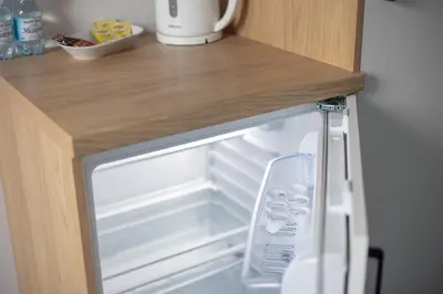 Kuchnia lub aneks kuchenny w obiekcie Aparthotel Esencja Warszawy Nowy Świat by BookingHost