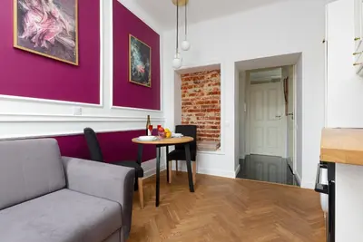 Część wypoczynkowa w obiekcie Apartament przy Placu Zamkowym by Noclegi Renters