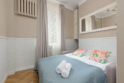 Łóżko lub łóżka w pokoju w obiekcie Apartament przy Placu Zamkowym by Noclegi Renters