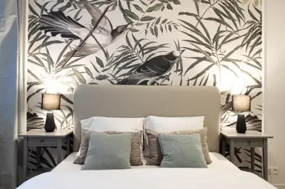 Łóżko lub łóżka w pokoju w obiekcie Arkadia Prime Apartment by BookingHost