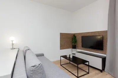 Telewizja i/lub zestaw kina domowego w obiekcie Artistic Żoliborz Apartments by Noclegi Renters