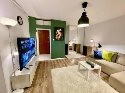Telewizja i/lub zestaw kina domowego w obiekcie HOLIDAY metro fast WiFi TV’70 Netflix HBO AppleTV