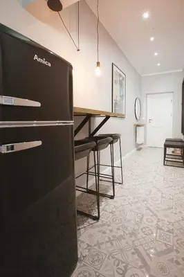 Kuchnia lub aneks kuchenny w obiekcie Warsaw Concierge Flat6 Hoza