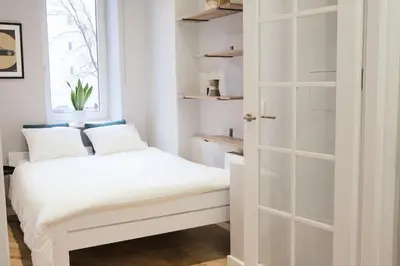 Łóżko lub łóżka w pokoju w obiekcie Warsaw Concierge Flat6 Hoza