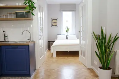 Łóżko lub łóżka w pokoju w obiekcie Warsaw Concierge Flat6 Hoza