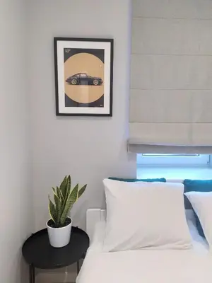 Łóżko lub łóżka w pokoju w obiekcie Warsaw Concierge Flat6 Hoza