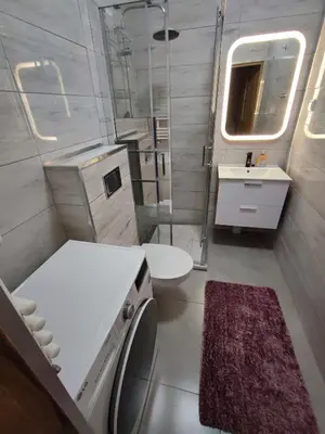 Łazienka w obiekcie Apartamenty Wola