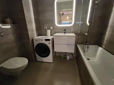 Łazienka w obiekcie Apartamenty Wola