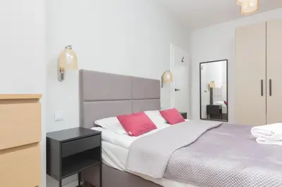Łóżko lub łóżka w pokoju w obiekcie Mokotów Apartment LUX with Parking by Renters Prestige