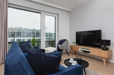 Telewizja i/lub zestaw kina domowego w obiekcie Mokotów Apartment LUX with Parking by Renters Prestige