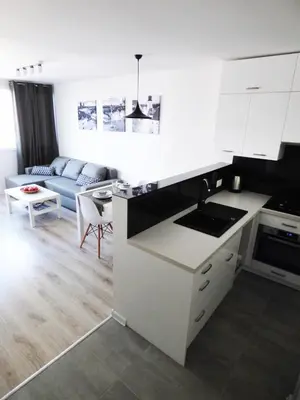 Kuchnia lub aneks kuchenny w obiekcie Plac Grzybowski Apartment by BookingHost