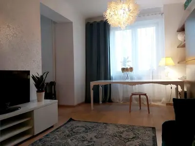 Telewizja i/lub zestaw kina domowego w obiekcie Apartament Koszykowa 1