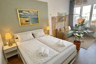 Łóżko lub łóżka w pokoju w obiekcie Central & Quiet - Kredytowa Apartment