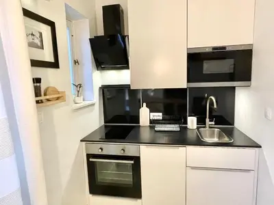 Kuchnia lub aneks kuchenny w obiekcie Central & Quiet - Kredytowa Apartment