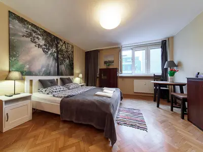 Łóżko lub łóżka w pokoju w obiekcie Sliska 10 apartament