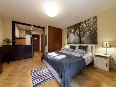 Łóżko lub łóżka w pokoju w obiekcie Sliska 10 apartament